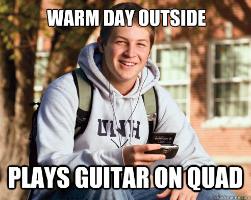warm day outside plays guitar on quad - College Freshman