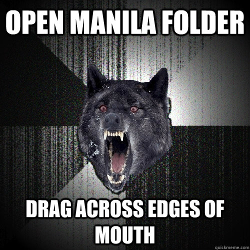 open manila folder drag across edges of mouth - Insanity Wolf