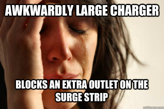 awkwardly large charger blocks an extra outlet on the surge - First World Problems