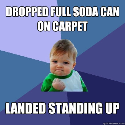 dropped full soda can on carpet landed standing up - Success Kid
