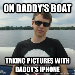 on daddys boat taking pictures with daddys iphone -