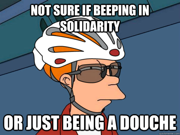 not sure if beeping in solidarity or just being a douche - road bike fry