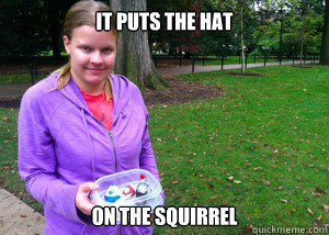 it puts the hat on the squirrel -