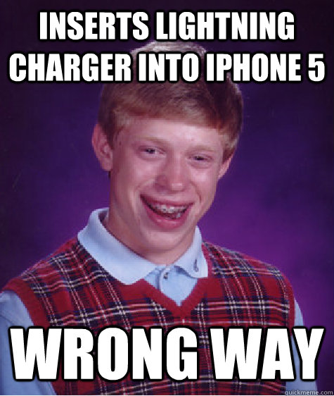 inserts lightning charger into iphone 5 wrong way - Bad Luck Brian