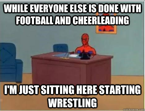 while everyone else is done with football and cheerleading i - Spiderman Desk