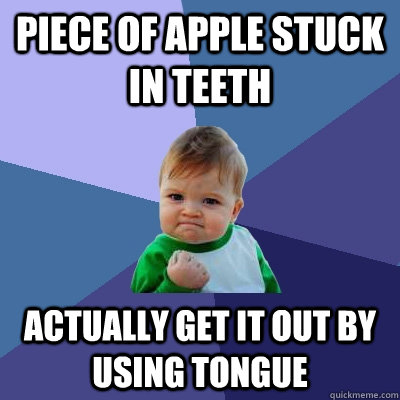 piece of apple stuck in teeth actually get it out by using - Success Kid