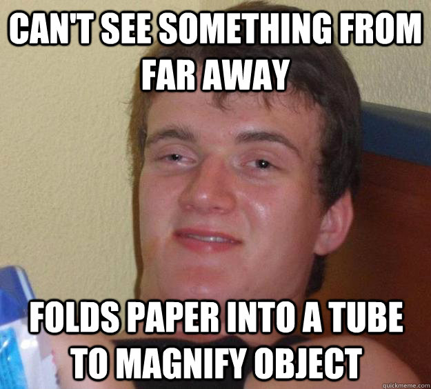 cant see something from far away folds paper into a tube to - 10 Guy