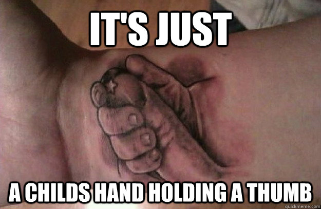 its just a childs hand holding a thumb -