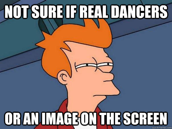 not sure if real dancers or an image on the screen - Futurama Fry