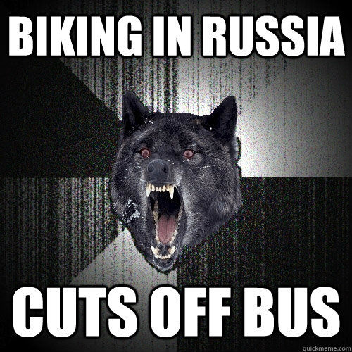 biking in russia cuts off bus - Insanity Wolf